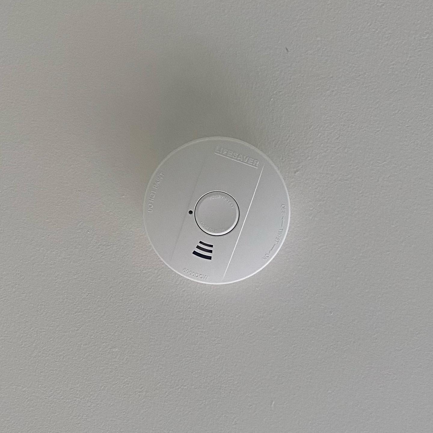 Smoke alarm installation and testing to AS3786 standards in an Inner West Sydney home