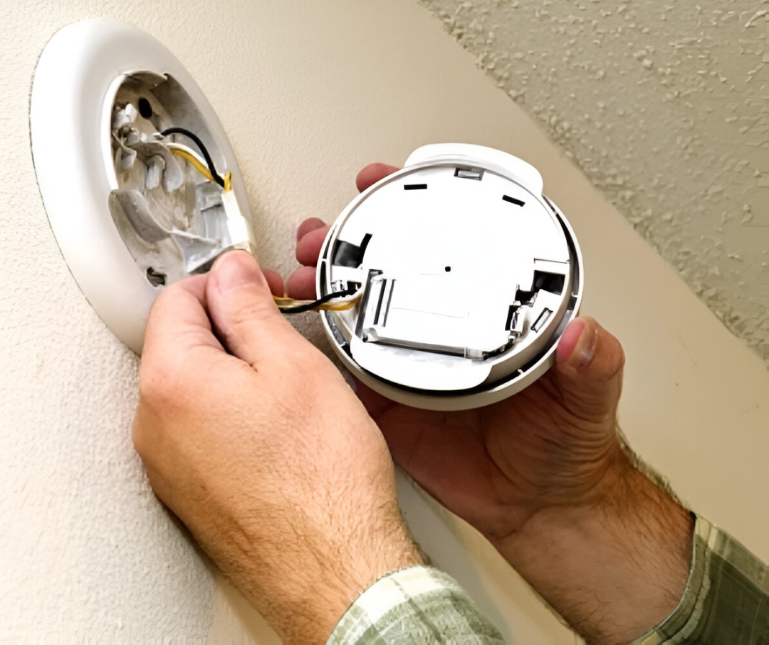 Hardwired smoke alarm installation with battery backup in an Inner West home